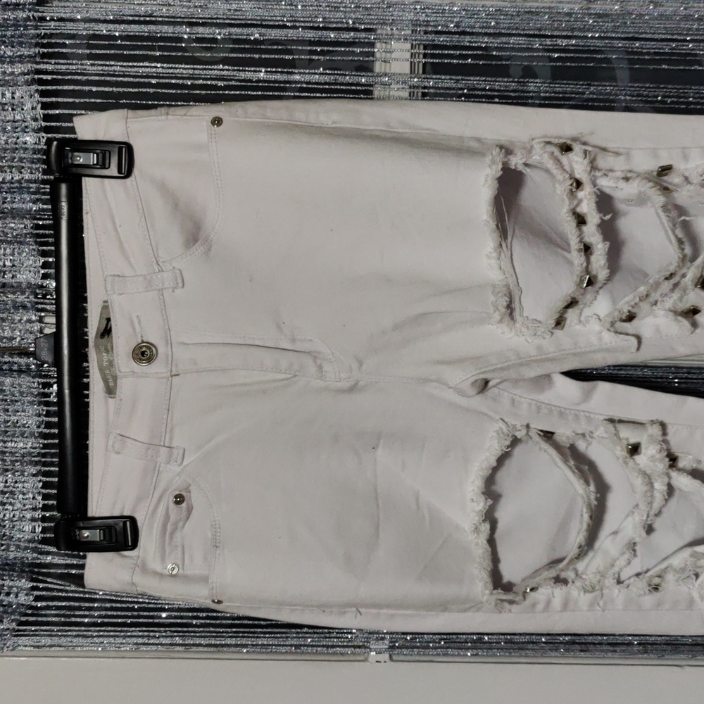 Blue topic jeans size 5/6 white with rips and studs